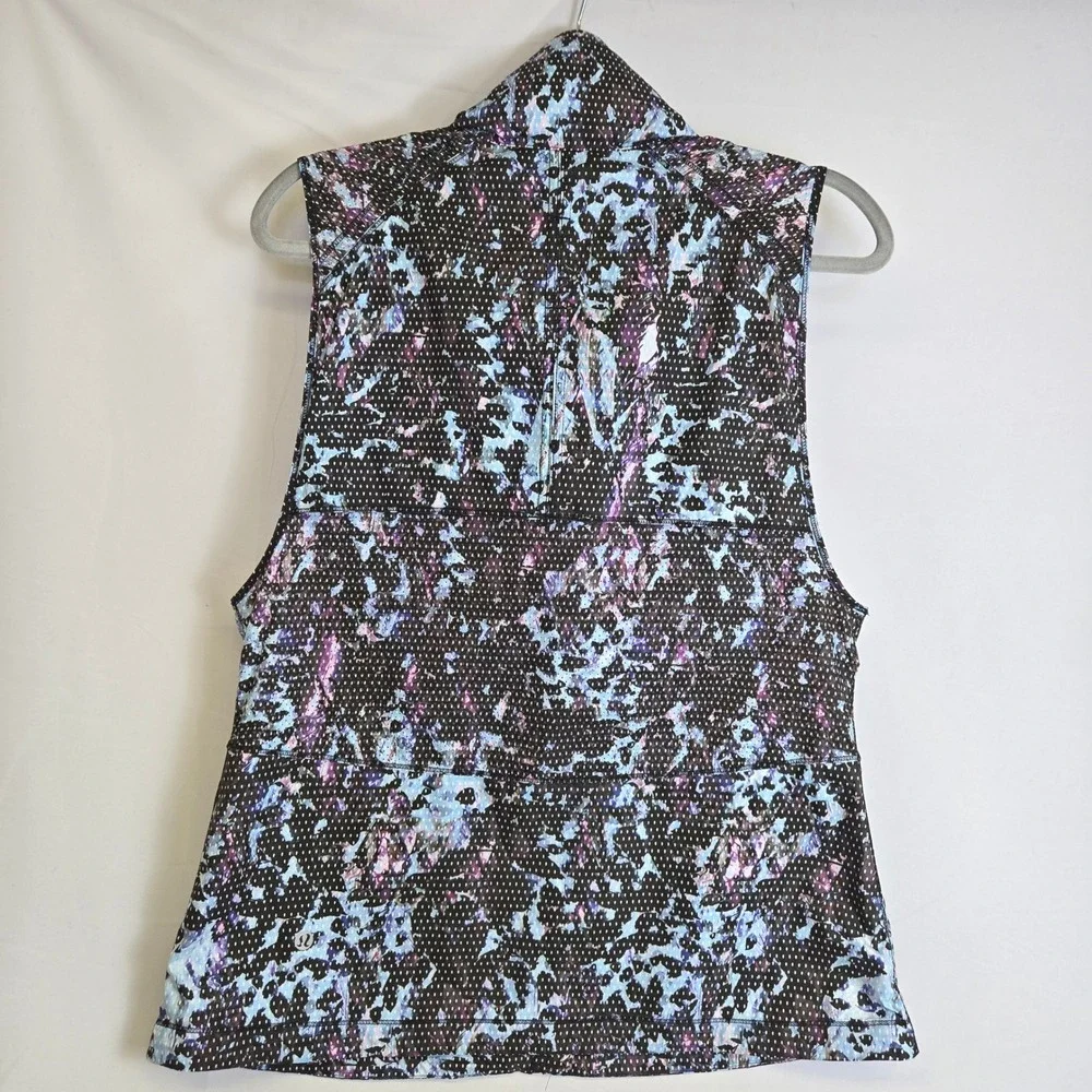 Lululemon Pack It Vest Floral Sport Tranquil Blue Multi Stow Away Hood Size 8